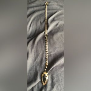 Black and gold pendant necklace
